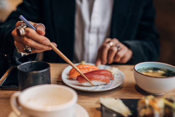 istock Mature man in sushi bar 1175890407