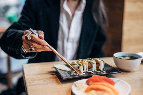 istock Mature man in sushi bar 1175890420