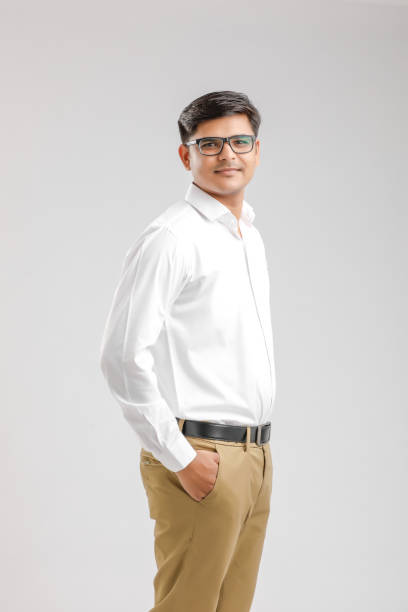 istock young indian man Standing over white background 1175891059