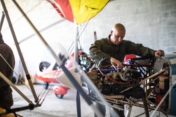 istock Expert hands taking care of airplane engine 1175892603