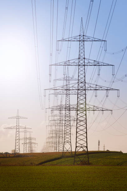istock Electricity pylons in a row particial under construction 1175895469