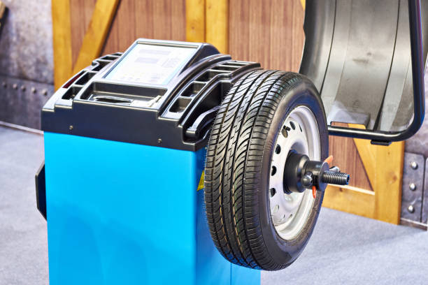 istock Stand for balancing wheels of car 1175896497
