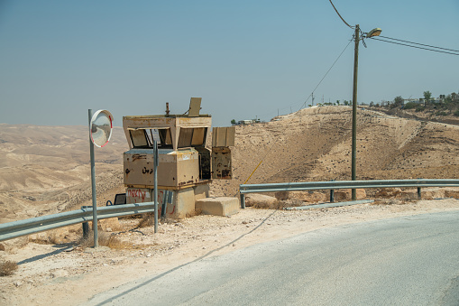 ISRAEL - AUGUST 30, 2019 : Small bullet-proof military station near new settlement construction