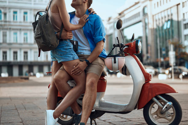 istock Romantic young couple is hugging on motorbike 1175898218