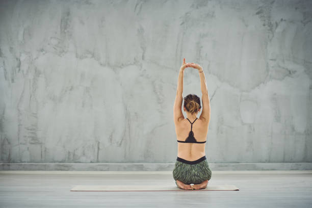 istock Woman doing yoga. 1175898566