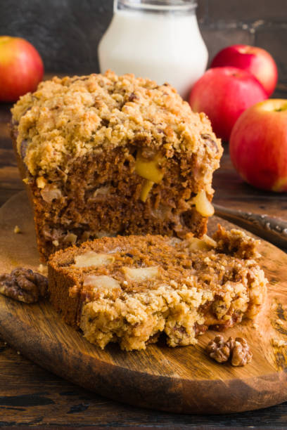 istock Sliced sweet apple and walnut pie on wooden rustic table 1175901533