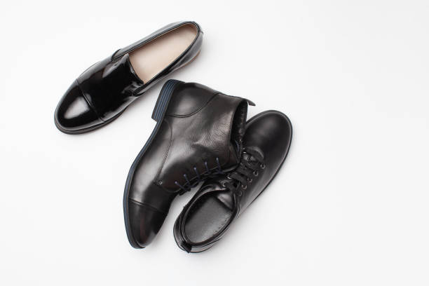 istock Different black leather women autumn shoes on white background 1175905991