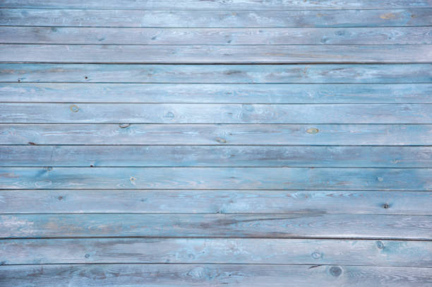 istock old background wooden plank texture, blue paint peeling 1175909784