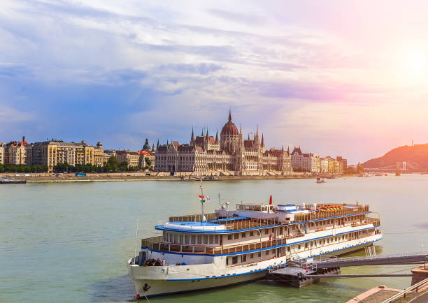 Pleasure boat on the Danube River, Budapest Pleasure boat on the Danube River, Budapest budapest danube river cruise hungary stock pictures, royalty-free photos & images