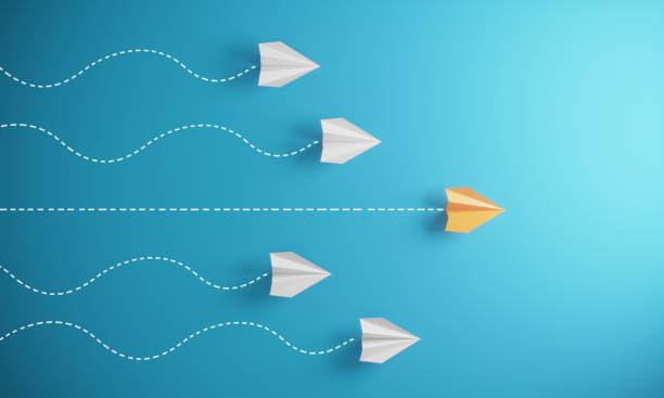 Leadership Concept With Paper Airplanes Group of paper airplanes, orange one is the first place, can be used leadership/individuality concepts. ( 3d render ) guidance abstract stock pictures, royalty-free photos & images