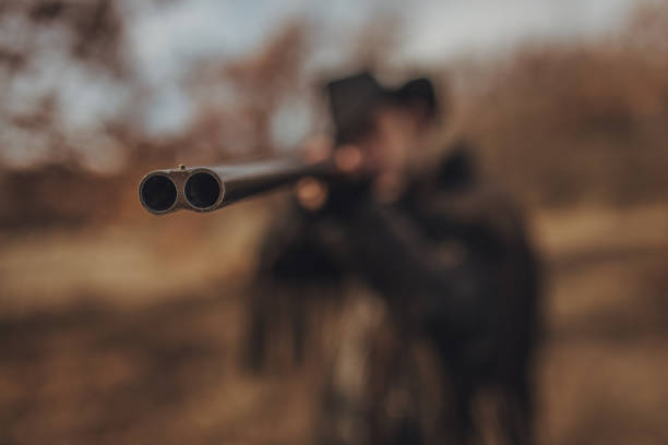 istock Pointed shotgun at you 1175912852