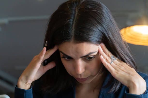 istock Overworked businesswoman 1175920909