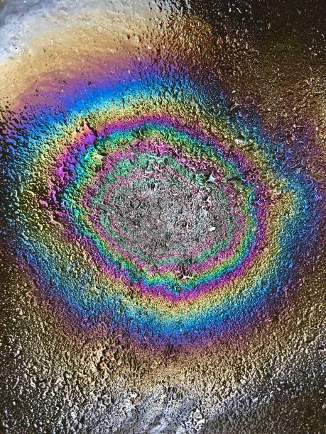 istock Oil spill on asphalt road 1175925288