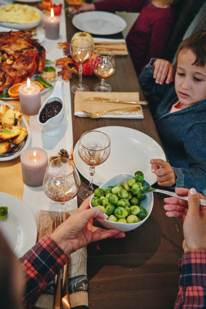istock Family Having Traditional Holiday Stuffed Turkey Dinner 1175925710