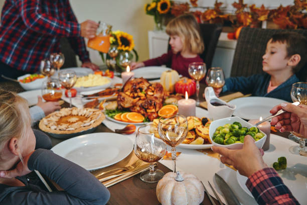 istock Family Having Traditional Holiday Stuffed Turkey Dinner 1175925726