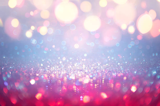 istock Christmas Glittering - Red And Blue Dust With Orange Bokeh Lights 1175928223
