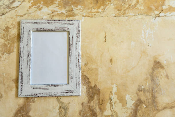 istock Blank picture hanging on a wall 1175928436