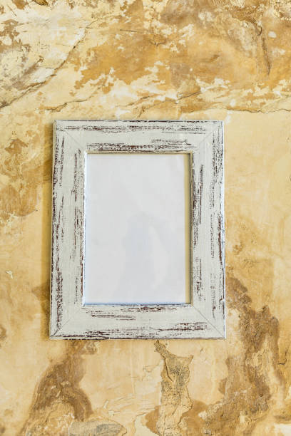 istock Blank picture hanging on a wall 1175928468