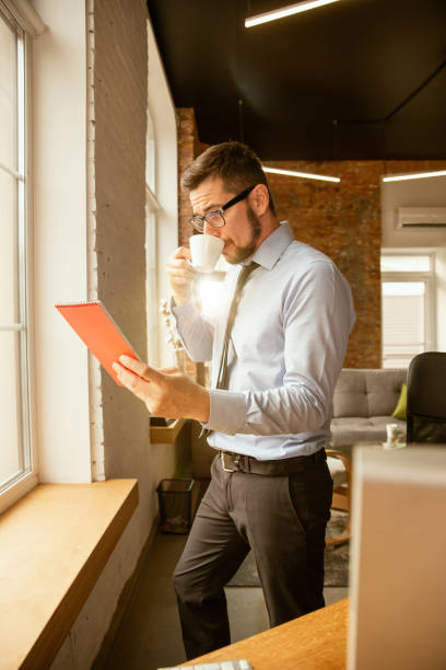 istock A young businessman working in office after promotion 1175931112
