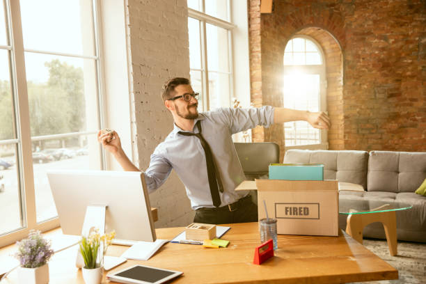 istock Young businessman fired, looks upset 1175931234