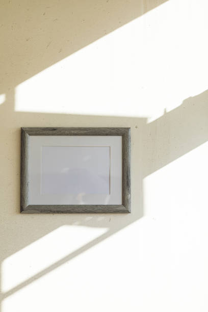 istock Blank picture hanging on a wall 1175932633