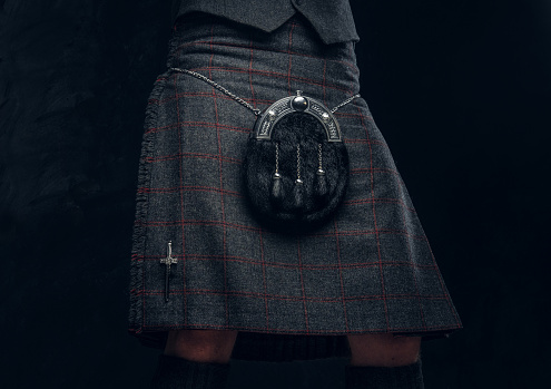 Traditional Scottish costume. Kilt and sporran.