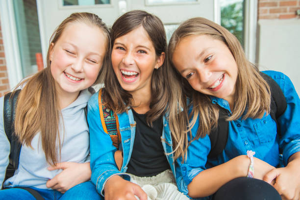 istock Some nice kids on the school background having fun 1175934442