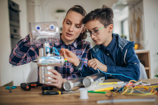istock Boy and sister making toy 1175935705