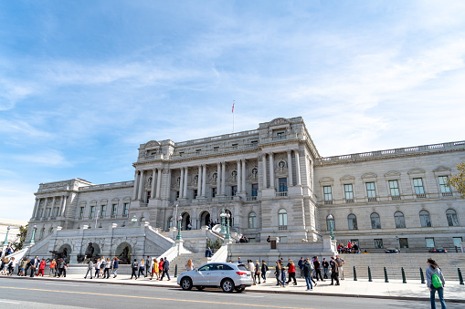 People walking in front of the Library of Congress in Washington DC, USA.