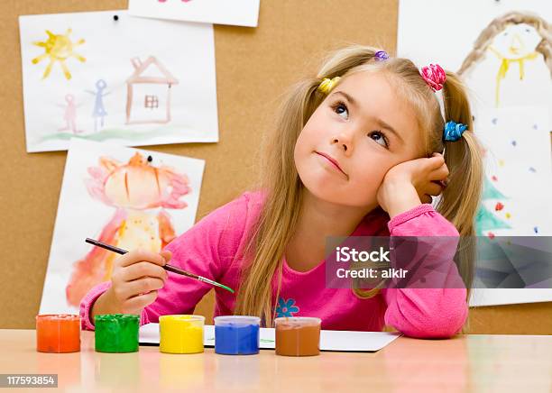 A Little Girl Is Working With Various Colors Painting Stock Photo - Download Image Now