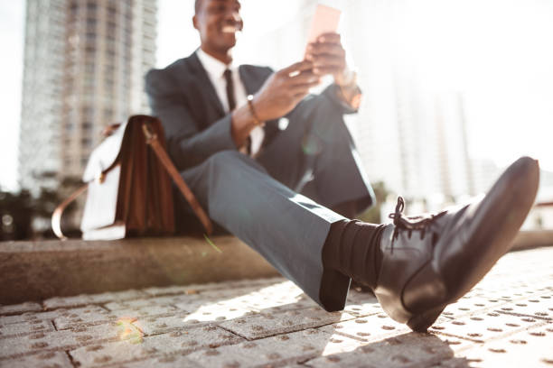 istock businessman make a phone call in miami 1175939905