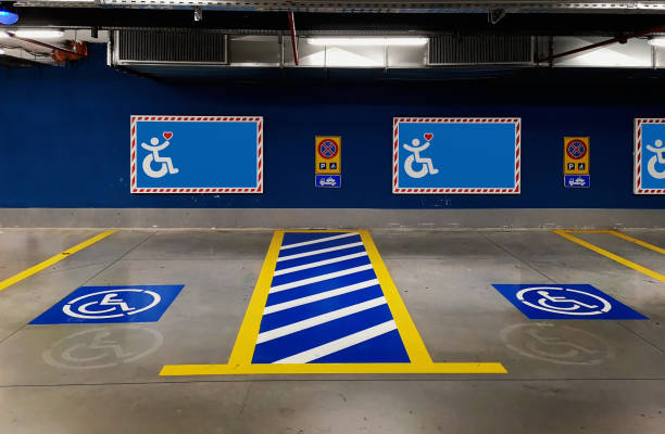 international handicapped symbol painted on parking space. - physical impairment wheelchair disabled accessibility imagens e fotografias de stock