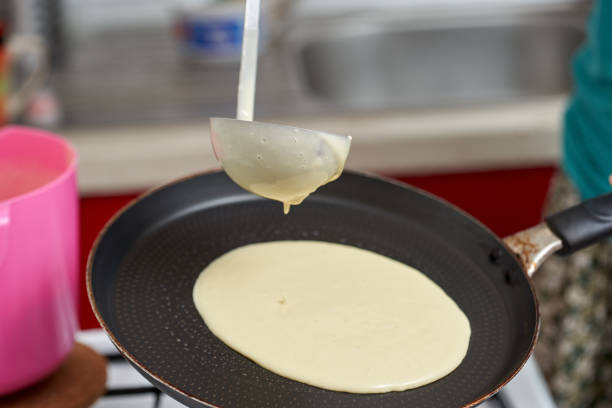 istock Cooking pancakes at home 1175940518