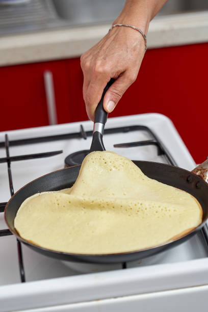 istock Cooking pancakes at home 1175942456
