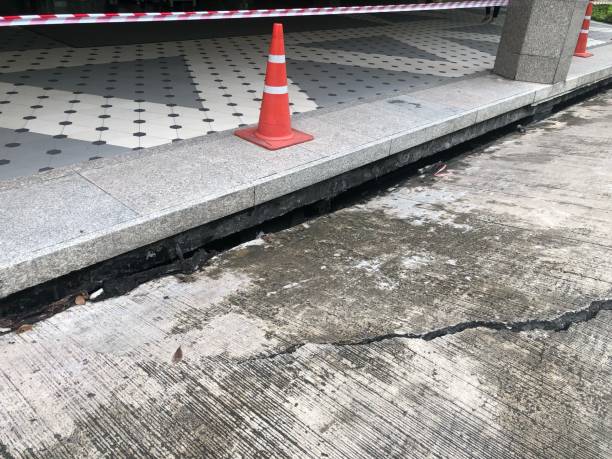 istock The cement floor has collapsed Causing damage to the cement floor Therefore must be careful not to let people enter the risk area. Which may be dangerous 1175946356