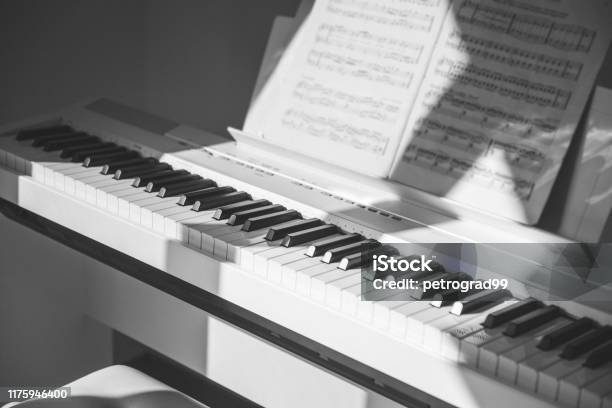 Closeup Photo Of Electronic White Piano At Home Stock Photo - Download Image Now - Learning, Piano, Education