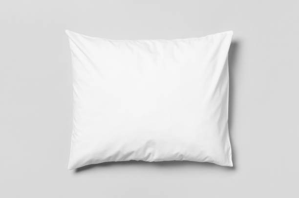 White blank pillowcase mockup. Grey background. White blank pillowcase mockup. Grey background. cushion stock pictures, royalty-free photos & images