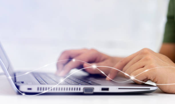 close up network man typing on keyboard laptop to access internet with virtual interface fiber optical   telecommunication to exchange data information in the cyber network for business and futuristic technology communication concept - laboratório de informática imagens e fotografias de stock