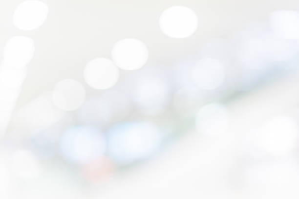 istock Abstract blurred soft white beautiful of electronic lamp light interior room background for merry christmas and happy new year festival design banner 
concept 1175951634