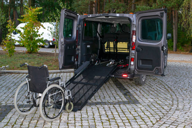 handicap van with ramp on the street - vehicle door flash imagens e fotografias de stock