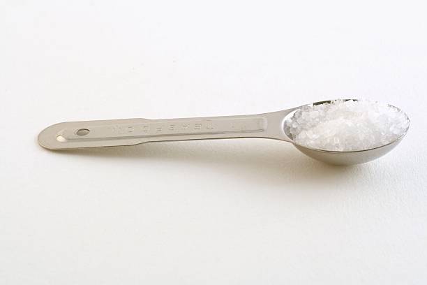 Measurning spoon with salt  teaspoon stock pictures, royalty-free photos & images