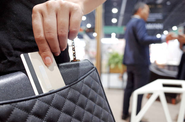 istock Credit cards in bag leather. shopping 1175957140