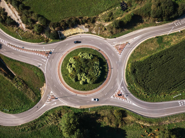 istock Roundabout with 4 ways as seen from directly above 1175961757