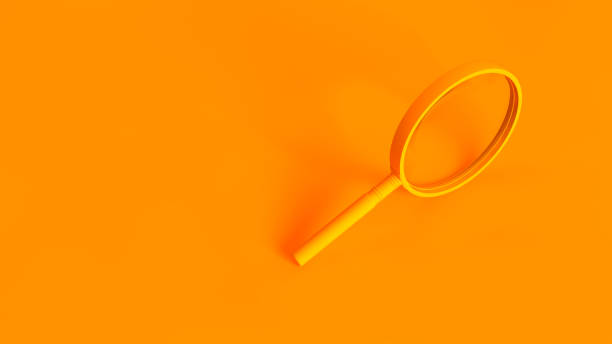 istock Magnifying glass isolated on orange background. Conceptual image of analysis, search, explore, analytics. 1175962907