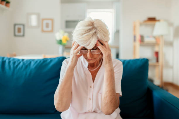 istock Senior woman having a headache 1175963205