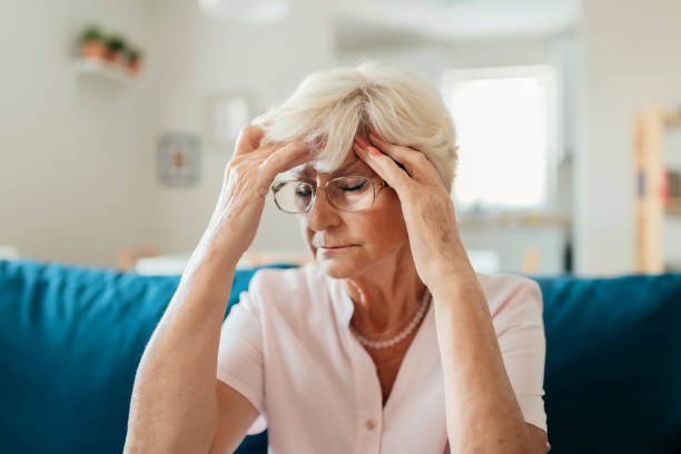 istock Senior woman having a headache 1175963211