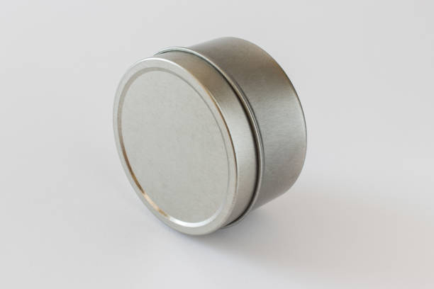 istock Mock up metal jar tin can laying on a side for presentation on white background 1175963912