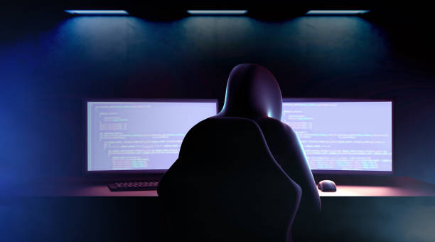 istock Dangerous hooded hacker with dark atmosphere and multiple displays. 3d render 1175965506