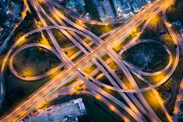istock Aerial view of road interchange at night 1175973272