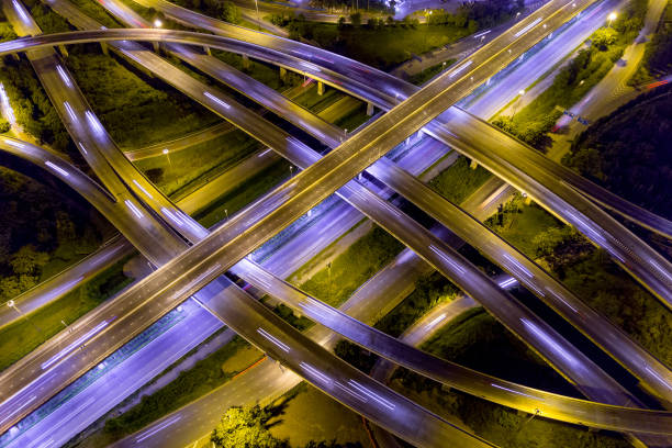 istock Aerial view of road interchange at night 1175973850